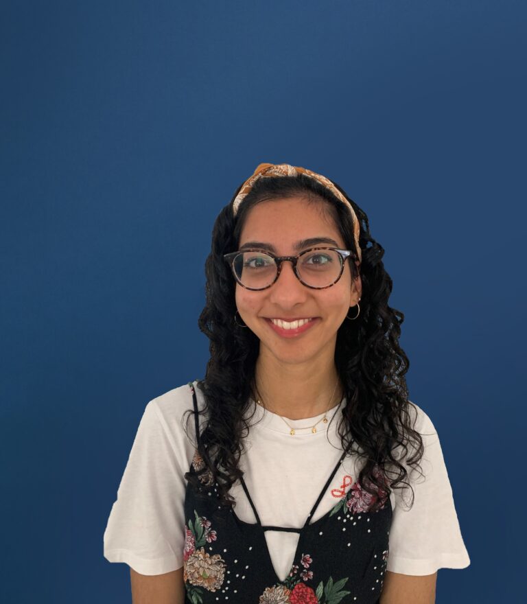 Image of Ayesha Ali on a dark blue background