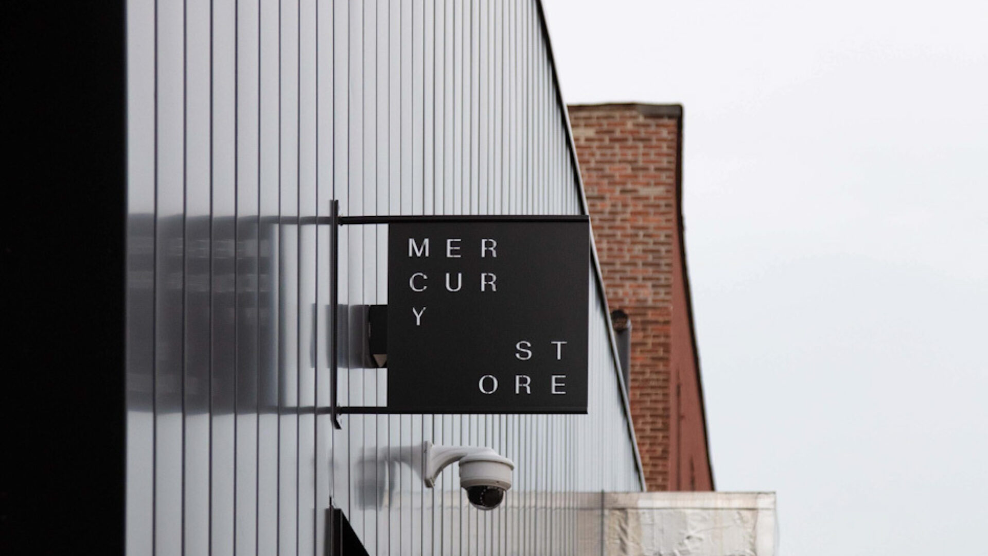 Exterior of the Mercury Store, you can see the black metal sign with mercury store cut out letters